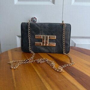 Faux leather black flap gold metal crossbody